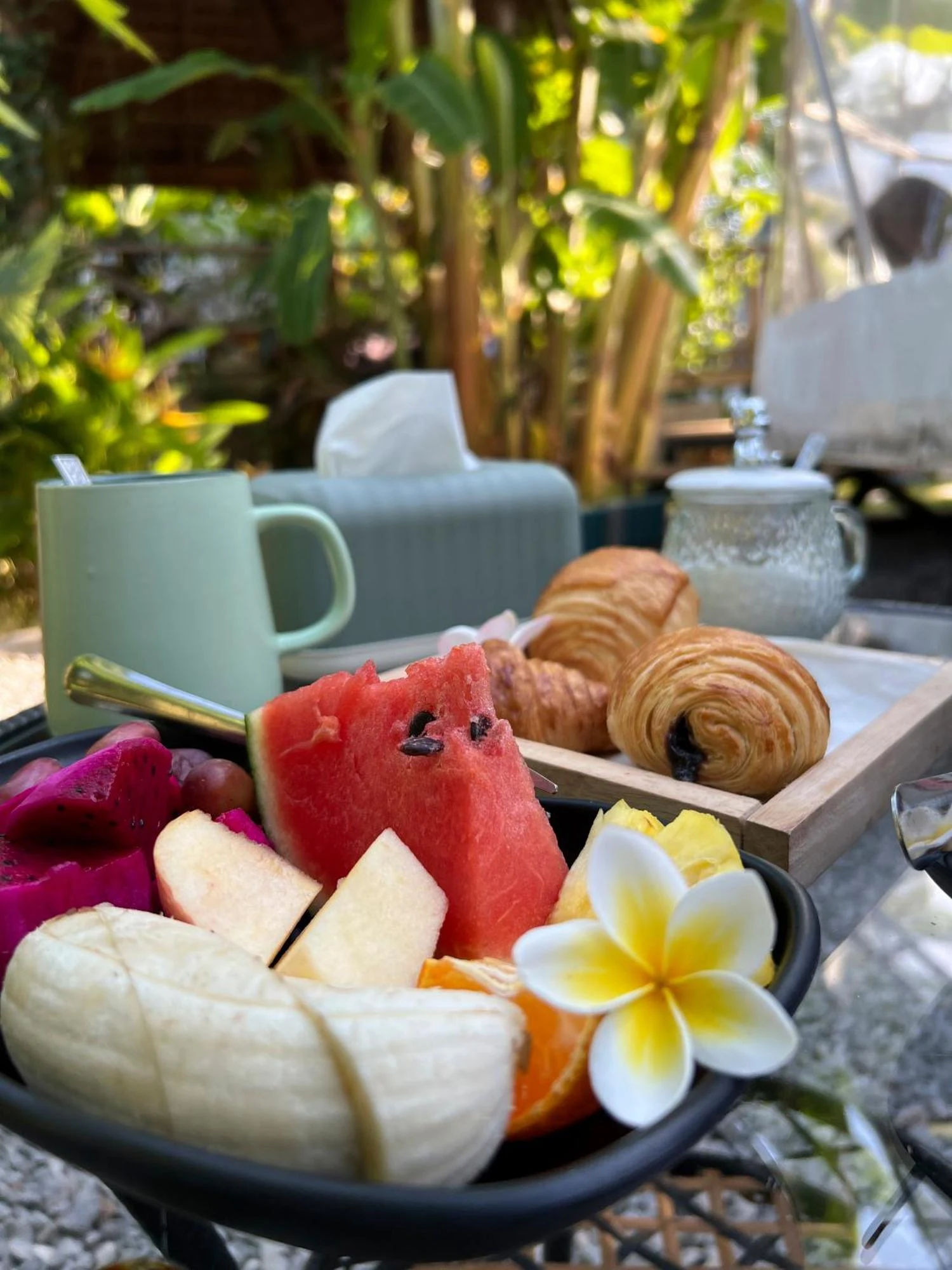 Fresh fruit and pastries at breakfast in Domea’s garden